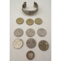A vintage silver cuff bracelet, together with a small selection of vintage British and American coin... 
