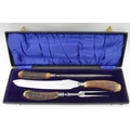 A 19th century antler handled carving set, by John Wigfall and Co. of Sheffield, in original box.