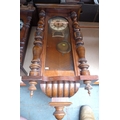 A large mahogany cased Vienna wall clock, horse surmount, twin train movement, with pendulum, 122cm.
