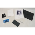 A collection of Concorde memorabilia including a grey faux leather A4 wallet, a notepad, a pen, post... 