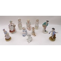 A collection of ceramic figurines including four 19th century Continental porcelain figures, togethe... 