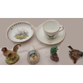 A collection of bird themed ceramics, including a reproduction miniature Tang style parrot figure, a... 