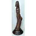 A large modern wooden figural carving, applied plaque to circular base 'Kikiuyu Woman & Child, Cork ... 
