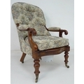 A Victorian Spademan of Stamford mahogany commode in the form of a nursing chair, upholstered seat c... 