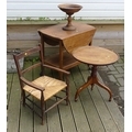 A group of furniture comprising a child's chair with rush seat, an oak hostess trolley with circular... 