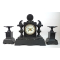 A slate mantel clock garniture, inlaid with green marble and gilt engraved decoration, cream dial wi... 
