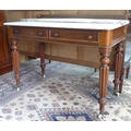 An early Victorian mahogany wash stand, with white marble surface, later wooden upstand, two frieze ... 