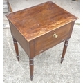 A 19th century mahogany bedside pot cupboard, lift lid and fall front with brass knob, raised on tur... 