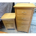 A modern oak narrow chest of five drawers, a/f drawers not opening, together with similar oak bedsid... 