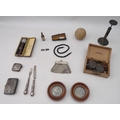 A group of collectables including some silver, including a silver vesta case, silver cigarette case,... 
