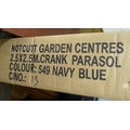 An octagonal white plastic garden table top, no legs, with circular blue and yellow floral centre, t... 