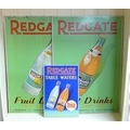 A pair of vintage tin signs advertising Redgate Fruit Drinks, one depicting Orange Crush, the other ... 