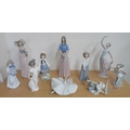 A collection of Nao figurines, including a number of dancing figures such as 'The Dance is Over'. (1... 