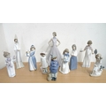 A collection of Nao figurines, including a number of child figures. (1 box)