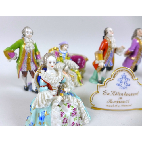 52 - A 20th century Rudolstadt Volkstedt Dresden porcelain part model orchestra, various figures forming ... 