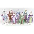 A group of Sitzendorf figurines, modelled as King Henry VIII and his six wives, 20th century, each i... 