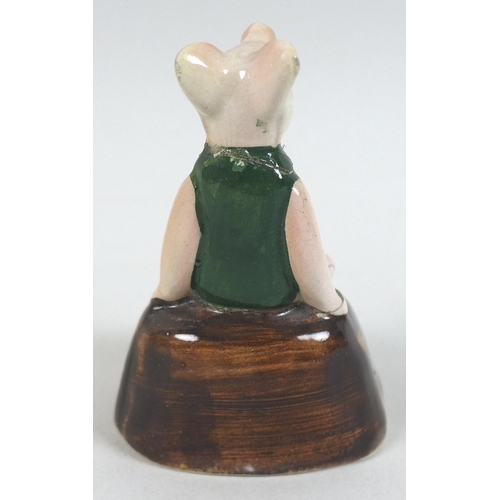 4 - A rare group of six Fulham Pottery Winnie-the-Pooh figurines, mid 20th century, modelled as Winnie T... 