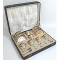An Art Deco cased Noritake and silver coffee set, comprising six coffee cans and six saucers, decora... 