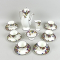 An Art Deco Royal Doulton part coffee set, circa 1930, decorated in the 'Honesty' pattern with a ban... 