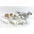 A group of Beswick and Royal Doulton figurines, comprising a Beswick pig 'Ch Wall Ch Boy 53', a Besw... 