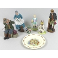 A group of Royal Doulton figurines, comprising the Favorite, HN2249, The Gaffer, HN2053, Old Willum,... 