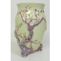 A Clarice Cliff Newport Pottery vase, 'Indian Tree' pattern, of baluster form on three moulded branc... 