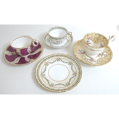 37 - A collection of 19th century cabinet teacups and saucers, including a Royal Crown Derby teacups and ... 