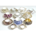 A collection of 19th century cabinet teacups and saucers, including a Royal Crown Derby teacups and ... 