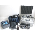 A collection of vintage cameras, lenses and equipment, including a Yashika Electro 35, Mamiya Super ... 