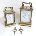 Two 20th century carriage clocks by Matthew Norman, the larger with white dial, black Roman numerals... 