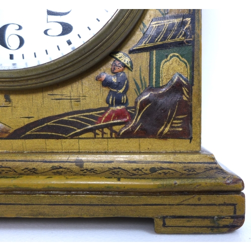 79 - A 20th century mantel clock, Chinoiserie decorated against a gold ground, the white dial with black ... 