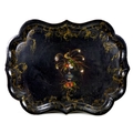 A Victorian ebonised and tole painted papier mache tray, scalloped edge, painted with flowers and a ... 