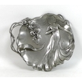 An Art Nouveau cast pewter dish by Achille Gamba, Italian circa 1900, decorated in relief with a you... 