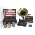 An Edwardian Edison Gem phonograph, with model C reproducer, serial 510796, oak cased, with black pa... 