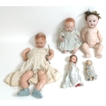 A group of vintage dolls, including an Armand Marseille doll, marked 975, 40cm long, and a BND, Lond... 