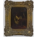 A small 19th century oil on panel, depicting a man in a hat and smock sat at a table, a candle leani... 