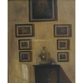 Dutch School (early 20th century): still life of a wall hung with seven paintings and a cabinet belo... 
