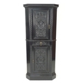 An early 20th century ebonised corner cupboard, in the manner of Collinson & Lock, of freestanding f... 
