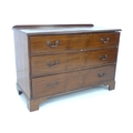 An early 19th century mahogany chest of drawers, of wide proportions, three drawers with brass swan ... 