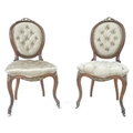 A pair of French 19th century salon chairs, brass mounted with beading, ribbon surmount and floral s... 