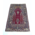 An antique Persian Teheran prayer rug, 'The Entrance to Temple', with wine coloured ground, mihrab a... 