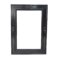 An early 20th century ebonised wall mirror, with bevelled rectangular plate, carved parallel frame s... 