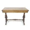 A Victorian walnut marquetry inlaid card table, raised on turned and carved supports with stretcher,... 