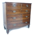 A Victorian mahogany bow fronted chest, two short of over three long drawers with oval brass plate h... 