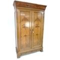 A French 19th century fruitwood armoire, two full length doors enclosing a hanging rail, 140 by 62 b... 