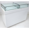 A modern white MDF shop display counter, with two top mounted glazed display cases fitted with light... 