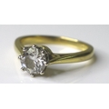 A diamond solitaire ring on an 18ct gold band, the brilliant cut stone approximately 0.5ct, size K, ... 