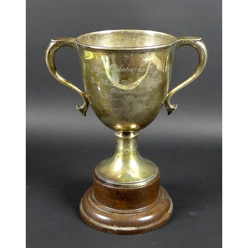 27 - A George V silver twin handled trophy, engraved 'The Coleherne Cup, Two Miles Race for Ponies, prese... 