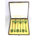 A set of six Art Nouveau Norwegian silver-gilt and green and white enamel teaspoons, marked WFB, lik... 