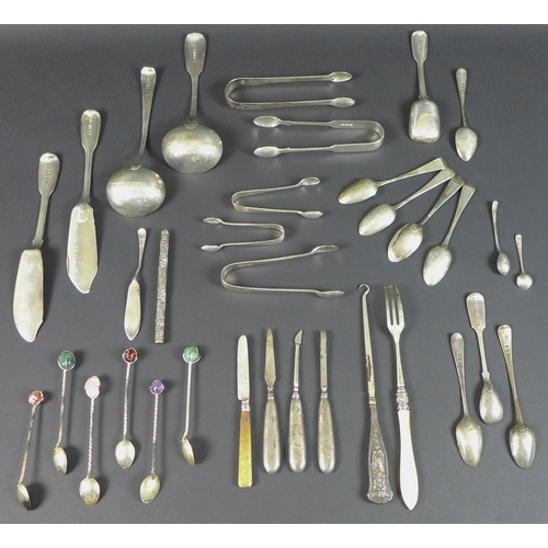 26 - A collection of silver flatware, including a 19th century Sterling silver needle case, a 20th centur... 